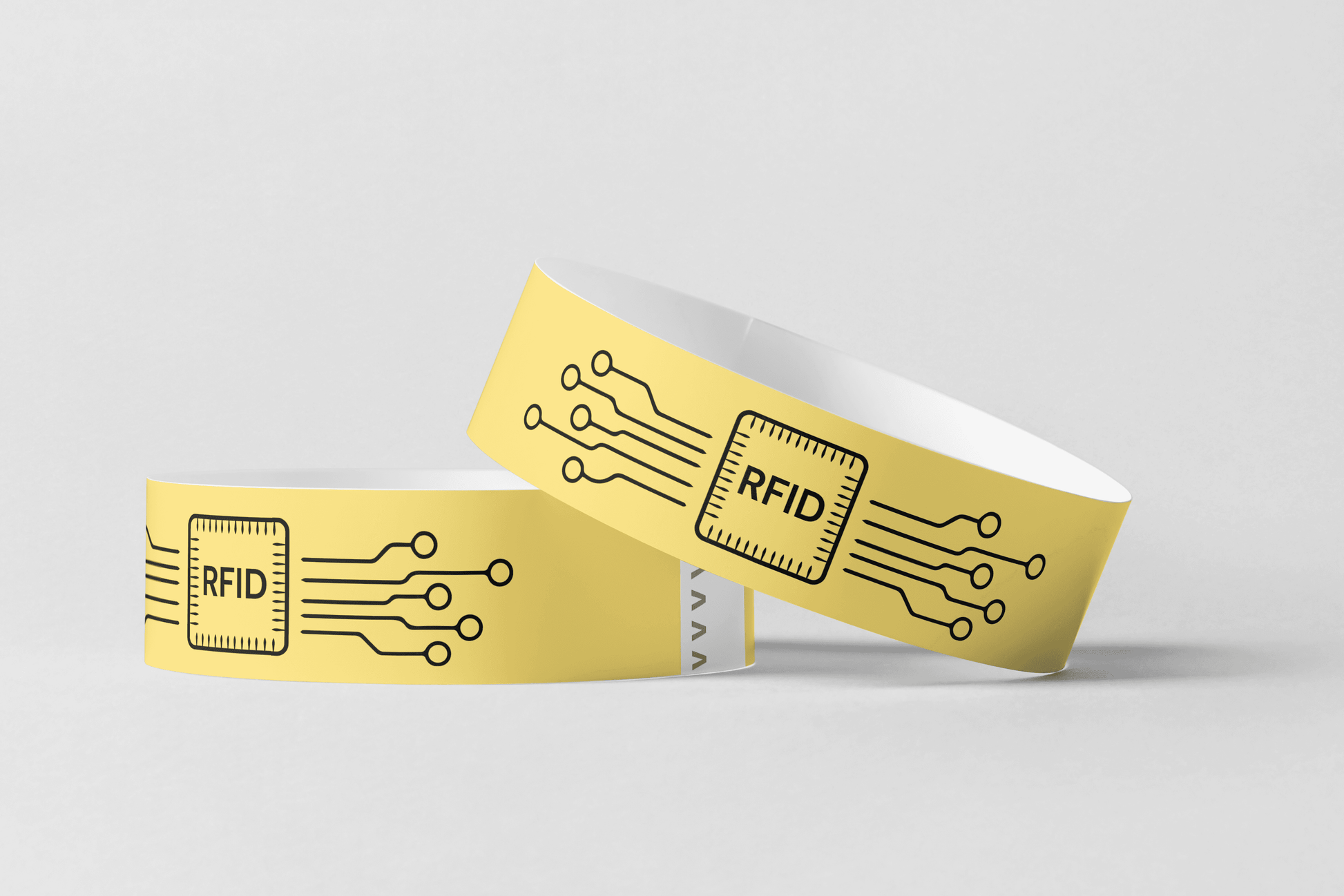 Ett par RFID-pappersarmband- färgtryck och mifare ul ev1-armband med en kretsdesign på.