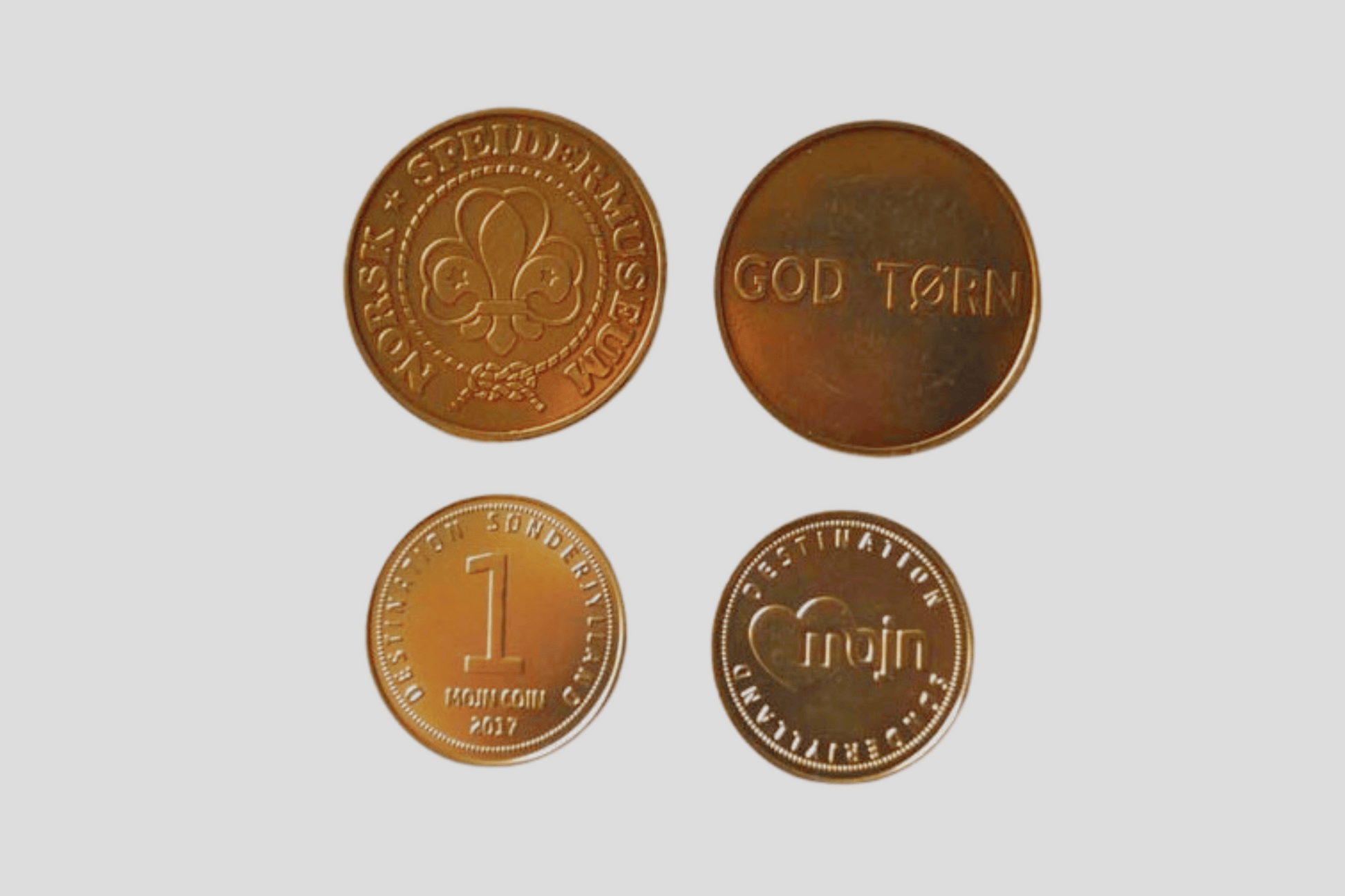 En polletter messing präglade med ordet god tonn Via e-post på den.