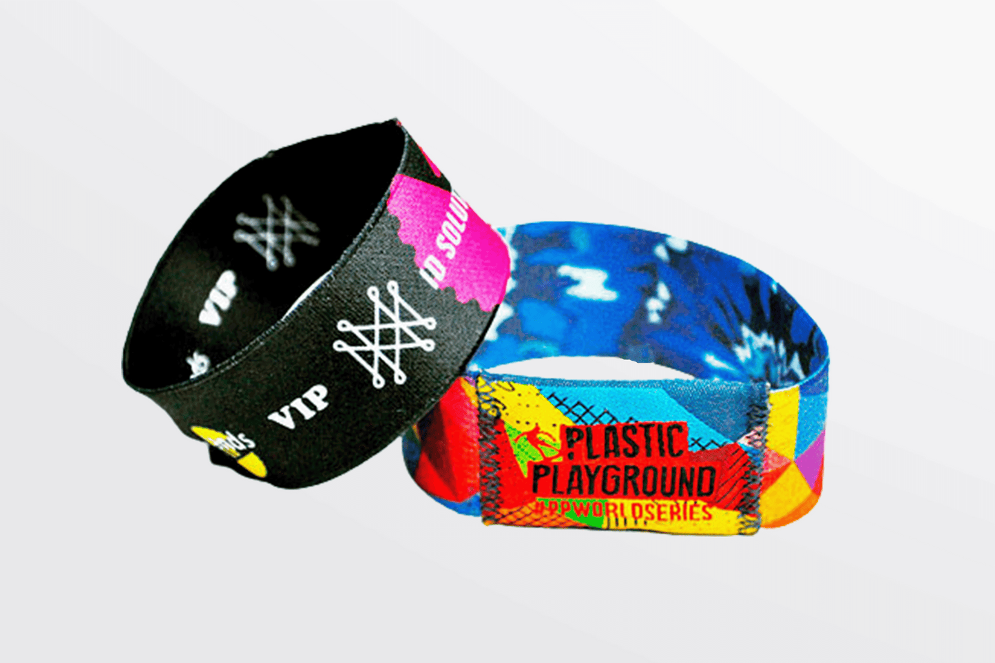 Ett foto av två Elastiskt Armband Färgtryck från JM Band®. Köp Tygarmband i 185 mm här.