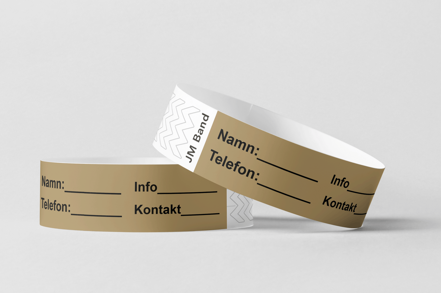 Två Papper ID-armband på vit bakgrund