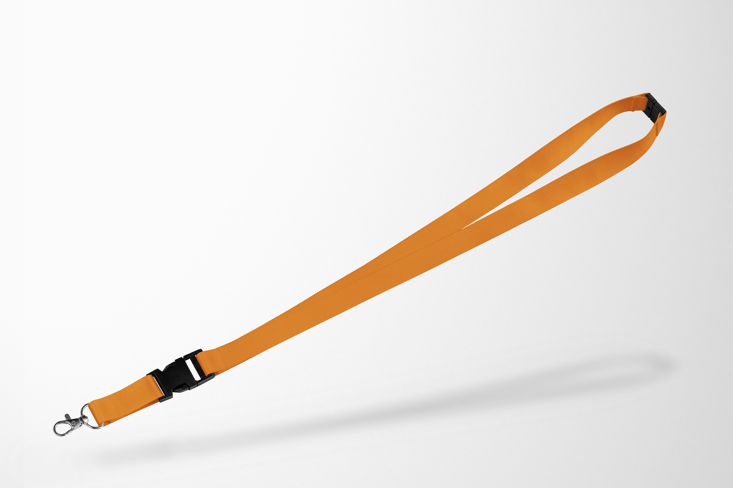 Ett foto av Nyckelband i lager utan tryck från JM Band®. Köp Nyckelband i Orange här.