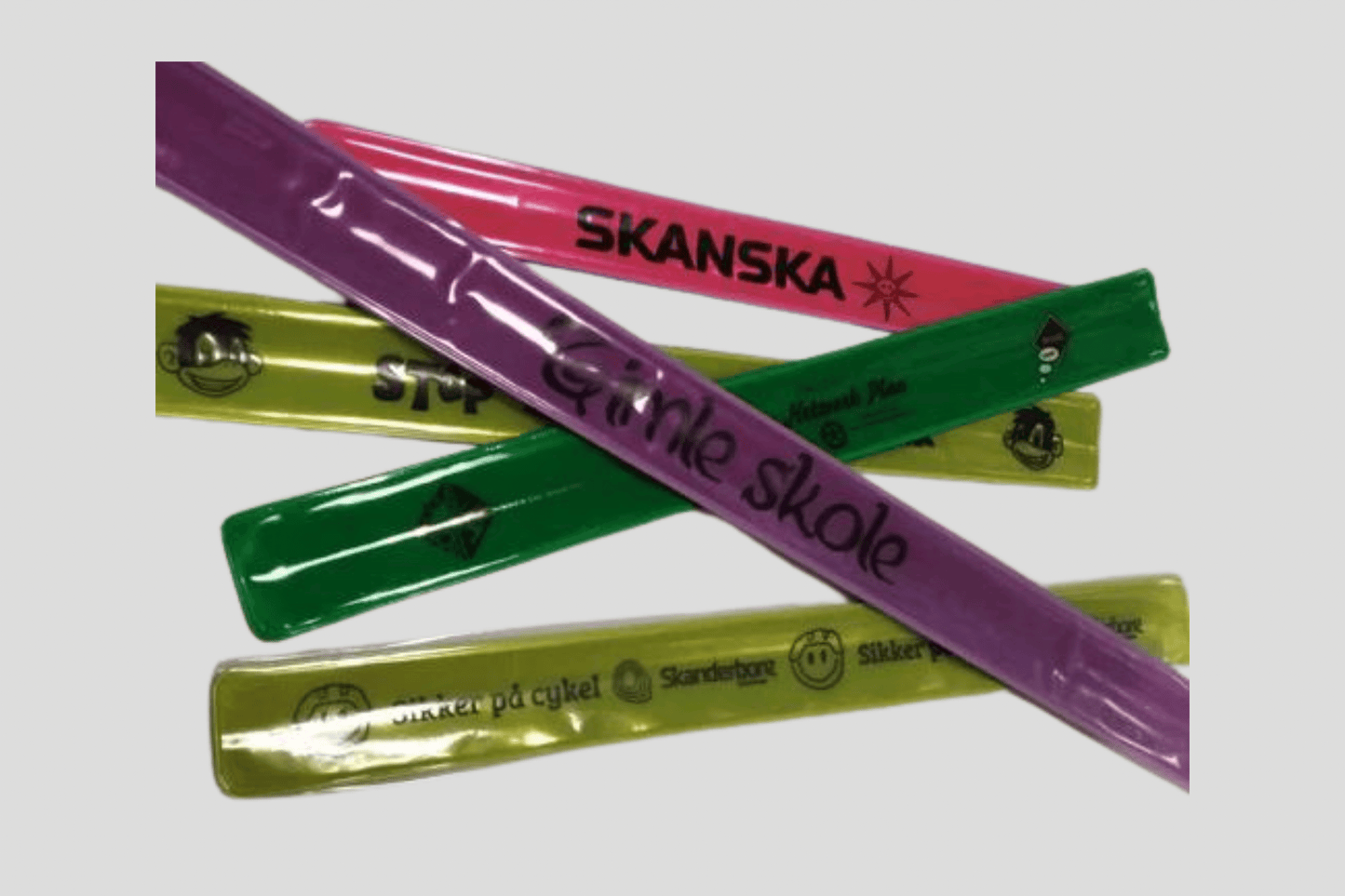 Slap-on Reflex-Armband med Tryck från JM Band®. Köp Plastikarmband i 3.0 X 30cm här.