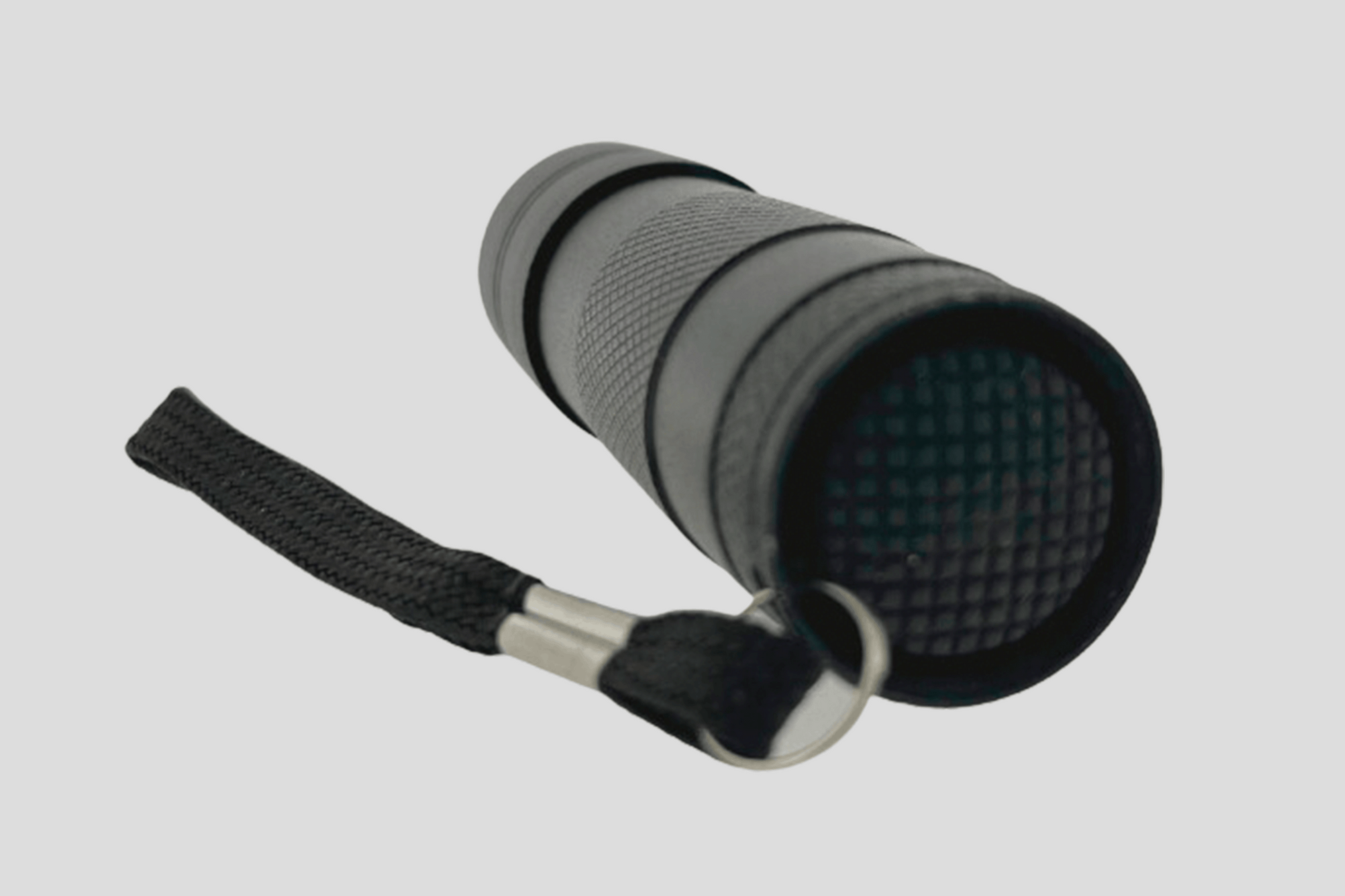 En svart UV ficklampa LED spektrum ficklampa på vit bakgrund.