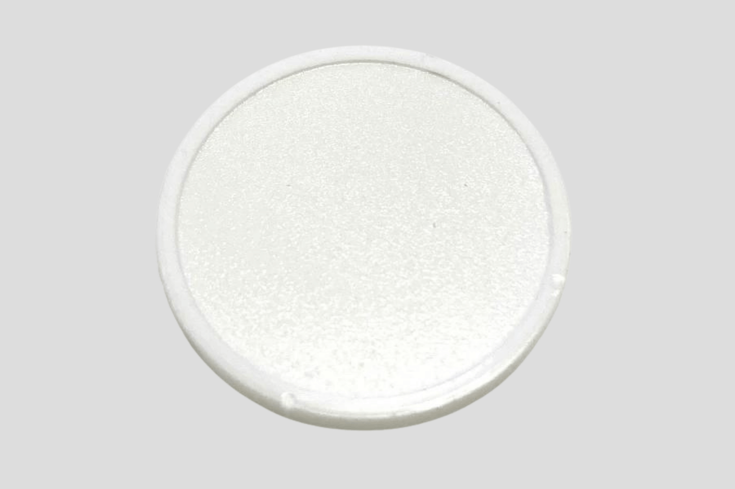 Ett foto av Präglade Plastpolletter i Lager från JM Band®. Köp Polletter i Blank Vit här.