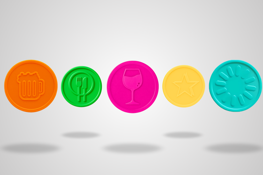 Ett foto av Präglade Plastpolletter i Lager från JM Band®. Köp Polletter i Öl Orange här.