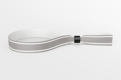 Ett foto av Textilarmband färger I lager från JM Band®. Köp Tygarmband i grå här.