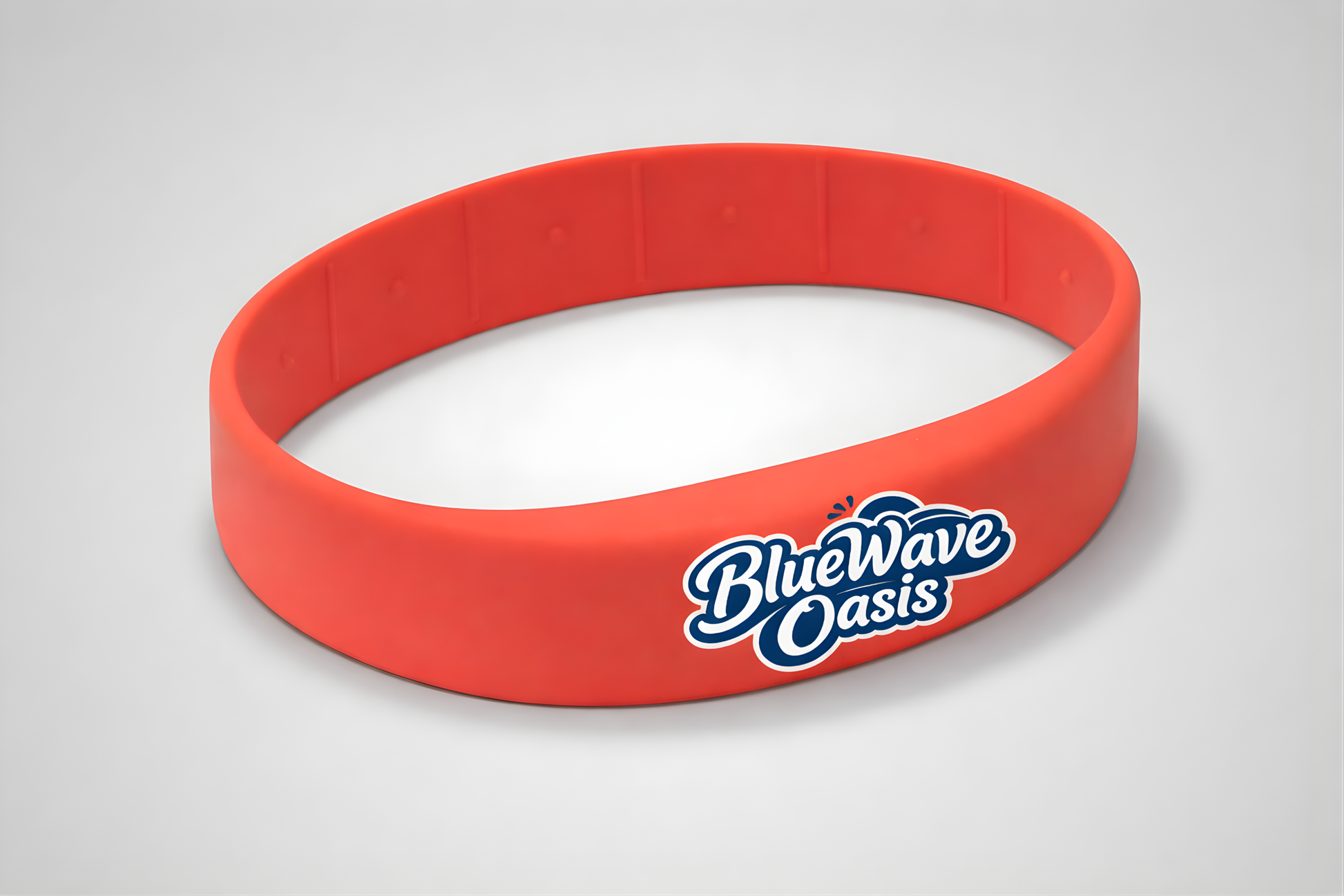 Ett rött silikonarmband med NFC och egen logotyp från JM Band®