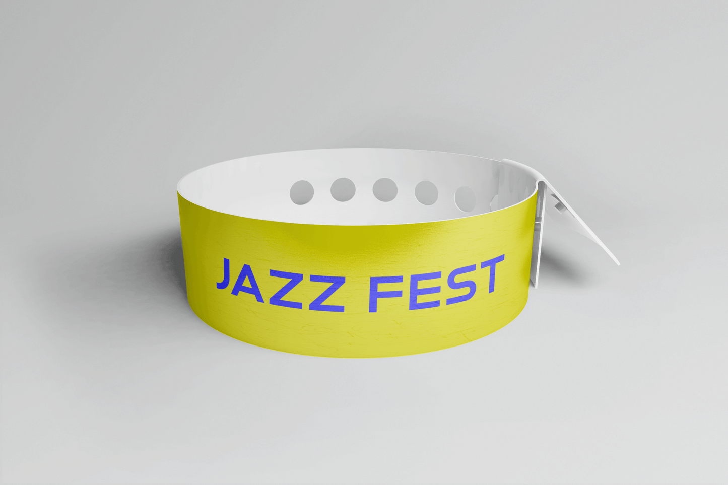 Ett rosa plastarmband L-print Design själv armband med ordet jazzfest på.