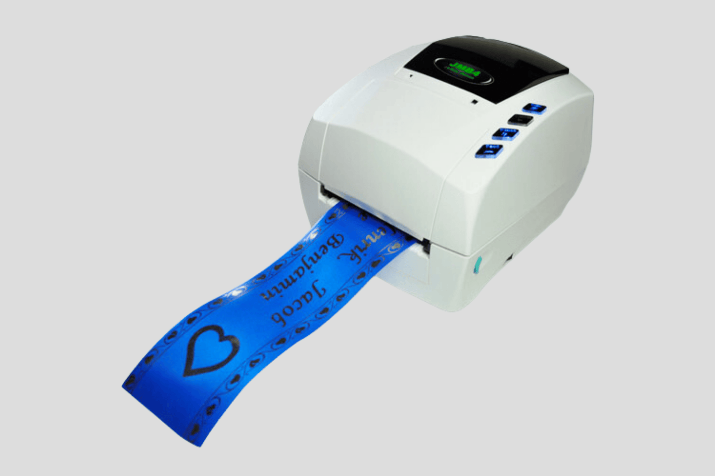 Ett Utskriftssystem JMB4+ med blå tejp fäst på textilarmband.