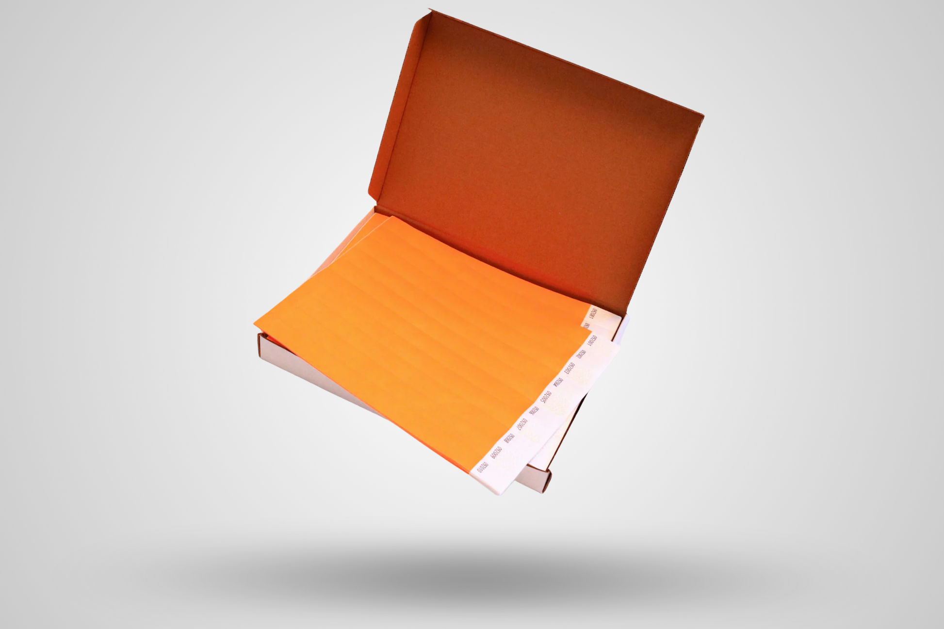 Ett foto av Pappersarmband Låda 1000st från JM Band®. Köp Pappersarmband i Orange här.